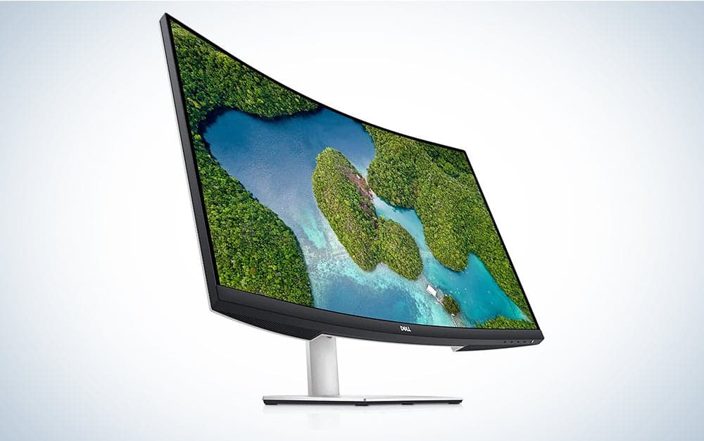 An angled view of the Dell S3221QS curved monitor displaying a nature scene.