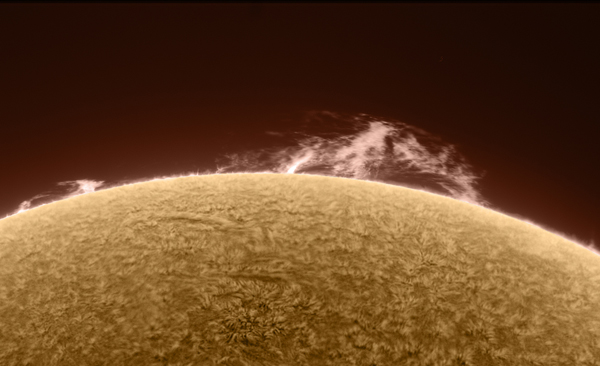 The sun through an H-alpha Filter by Alan Friedman