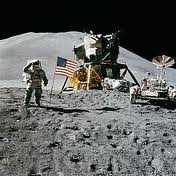 James Irwin salutes the US flag on August 1, 1971