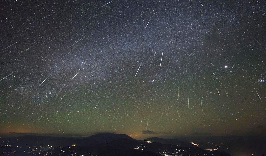 Composite photo of an Orionid meteor shower taken a few years ago. The constellation Orion is seen at lower right center. Credit: SLOOH 
