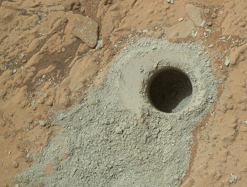 Curiosity drilled into the "Cumberland" rock, collecting a powder sample. (Image Credit: NASA/JPL-Caltech)