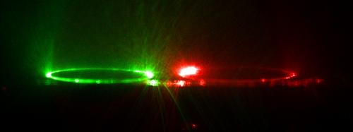 Solid-State Proteins Maximize The Intensity Of Fluorescent-Protein-Based Lasers