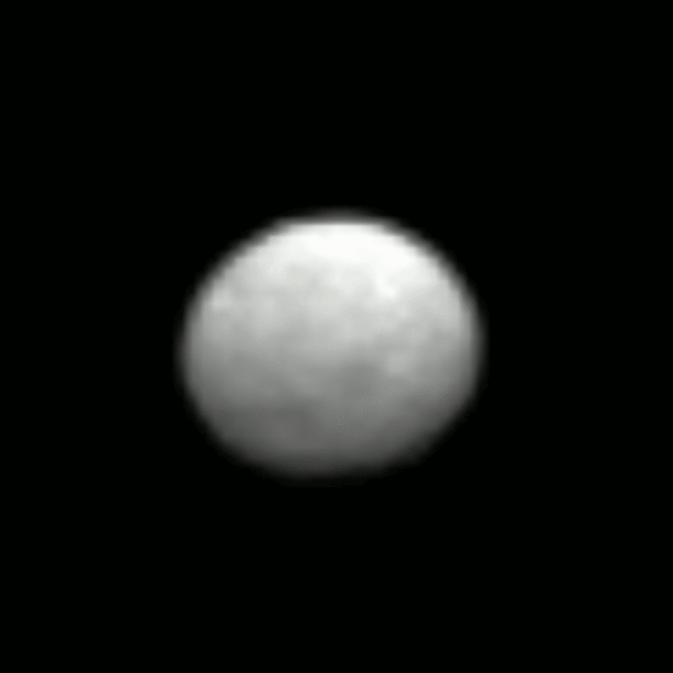 Animated gif of Ceres as seen by the Dawn spacecraft on Jan. 13, 2015, from a distance of 238,000 miles  A little more than half of its surface was observed and you can see both light and dark features. 