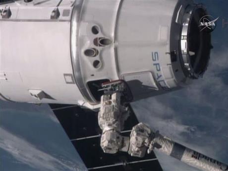 SpaceX supply ship arrives at space station with groceries