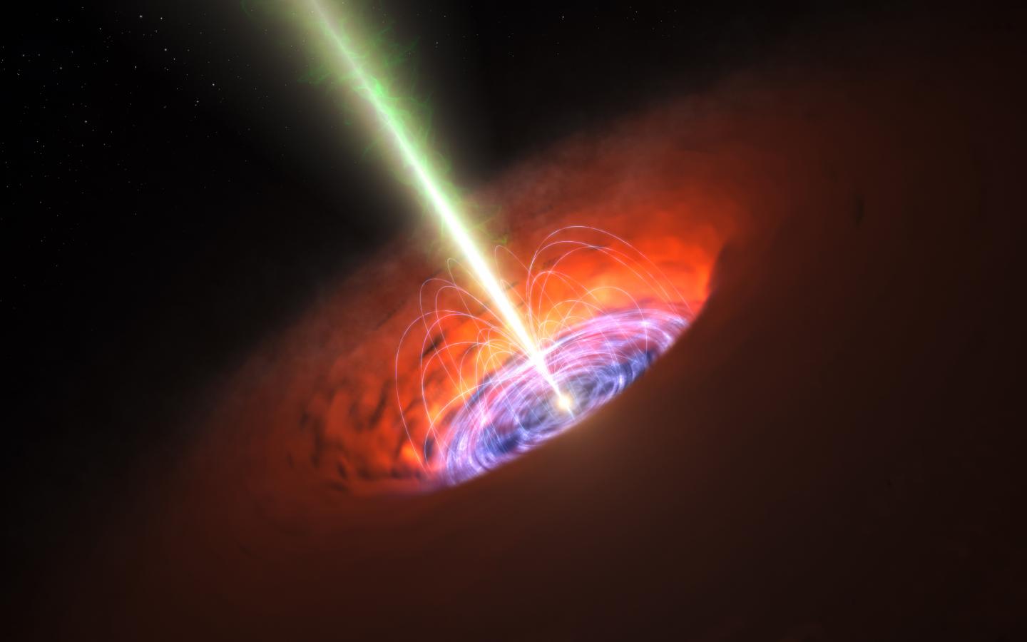 This artist's impression shows the surroundings of a supermassive black hole, typical of that found at the heart of many galaxies. The black hole itself is surrounded by a brilliant accretion disc of very hot, infalling material and, further out, a dusty torus. There are also often high-speed jets of material ejected at the black hole's poles that can extend huge distances into space. (Credit: ESO/L. Calçada)