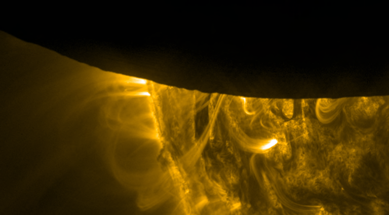 Solar Eclipse Followed by a Beautiful Flare (plus video)