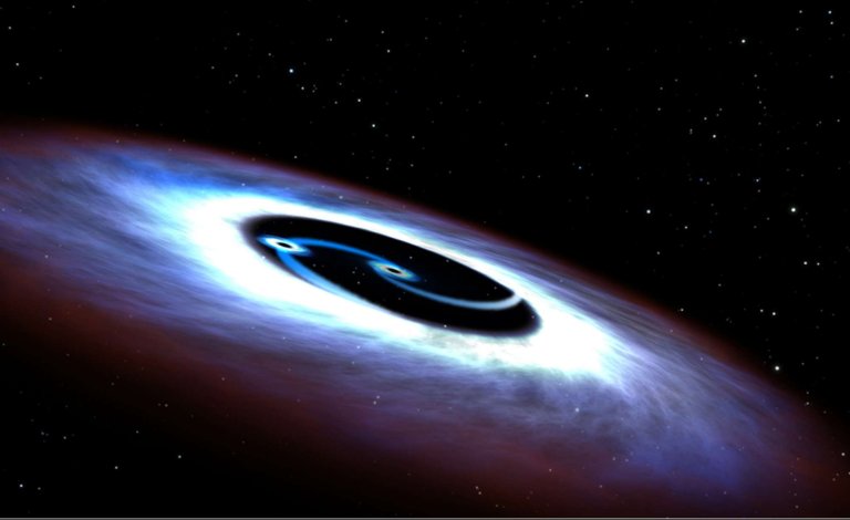 Scientists Discover Supermassive Black Hole Duo in Quasar Nearest Earth