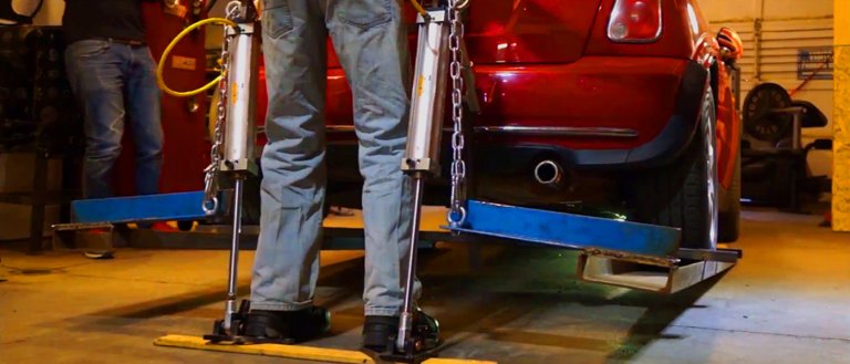 Canadian Inventor Uses Home-Made Iron Man Suit to Lift a Car