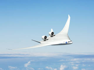 This version of a hybrid wing body aircraft concept has turbofan engines on top of the back end, flanked by two vertical tails to shield people on the ground from engine noise. Credits: NASA / Boeing