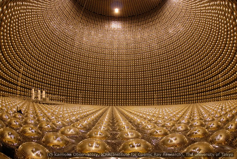 Science Explained: How Can We Weigh the Lightest Particle Known to Man?