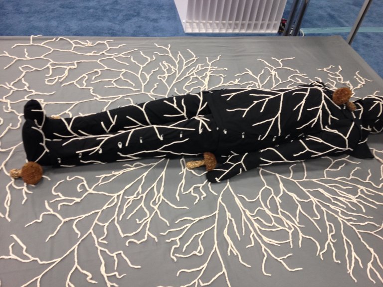 This Eco-Death Suit Lets Mushrooms Consume You When You Die