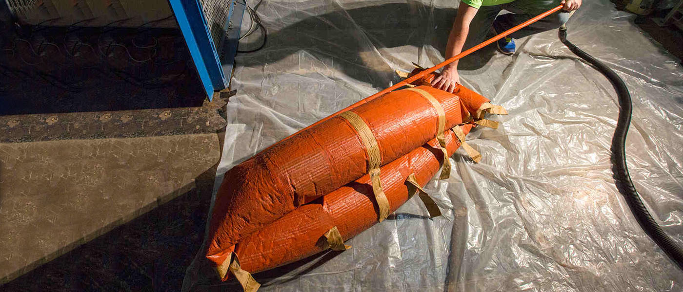 The HIAD being compressed by engineers. Credit: NASA