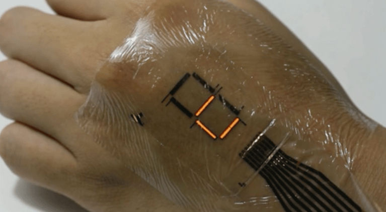 New Remarkably Thin E-Skin Turns Your Body Into a Walking Display