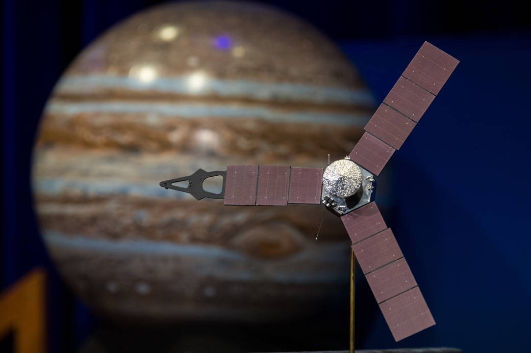 A model of the Juno spacecraft is seen at a news briefing, held before Juno enters orbit around Jupiter, on Thursday, June 30, 2016 at the Jet Propulsion Laboratory (JPL) in Pasadena, CA. The Juno mission launched August 5, 2011 and will arrive at Jupiter July 4, 2016 to orbit the planet for 20 months and collect data on the planetary core, map the magnetic field, and measure the amount of water and ammonia in the atmosphere. Photo Credit: (NASA/Aubrey Gemignani)