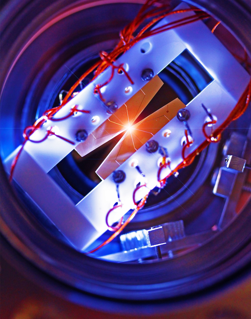Four segmented blade electrodes are used to trap a linear chain of atomic ions. Credit: Emily Edwards