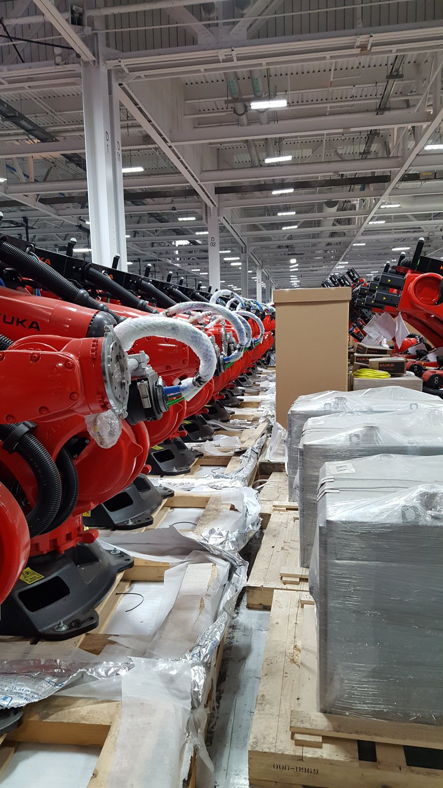 tesla kuka robotics model 3 automation