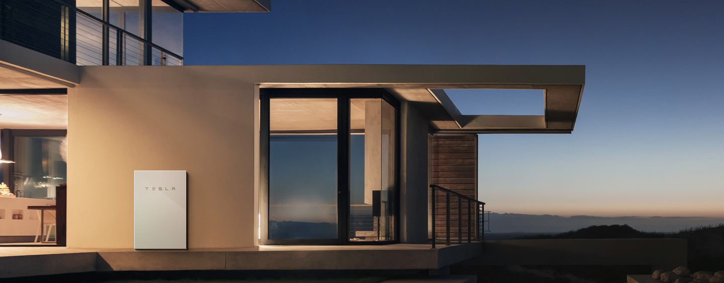 The Tesla Powerwall installed on the side of a home. Experts say batteries will be a huge part of our energy infrastructure to meet increasing energy storage needs.
