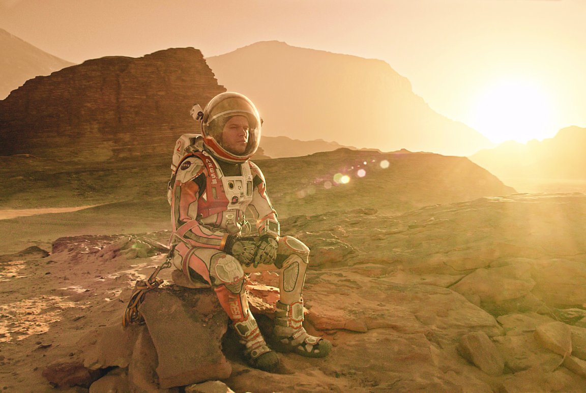 Mark Watney sits on Mars in The Martian.