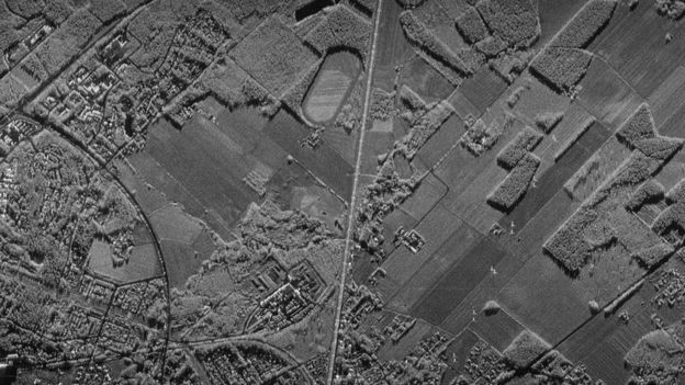A grayscale, high-relief landscape image captured by a synthetic-aperture radar satellite, such as the ones that will be in ICEYE's satellite swarms.