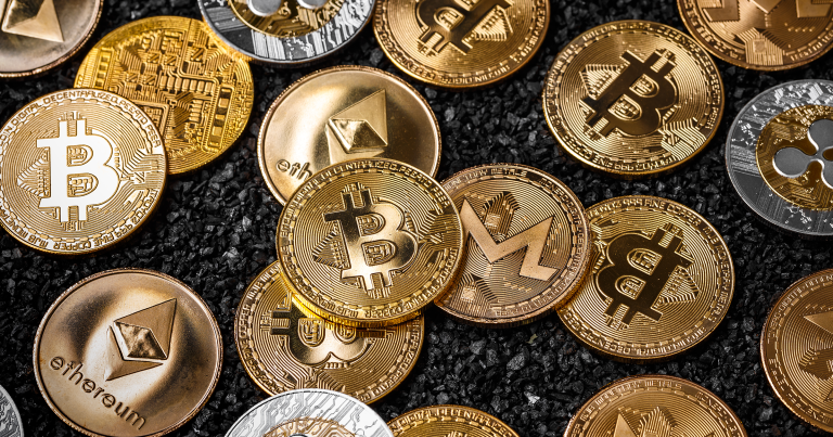 A pair of new cryptocurrency reports asserts that the asset class is still very risky for investors, but not much of a threat to the world economy.