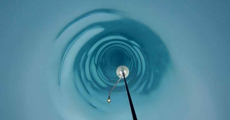 A team of scientists successfully drilled a hole, more than a mile in length, that went all the way through Antarctica's ice.