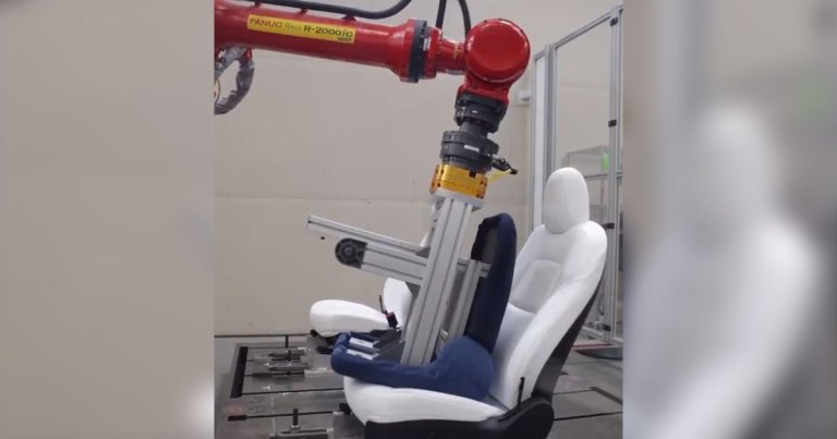 The electric car maker just showed off its jeans-wearing butt robot that tests its Model 3 seats in a showcase on Twitter.