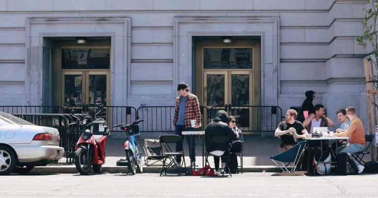 A web developer wants to turn San Francisco parking lots into coworking spaces, desks, folding chairs, and all.