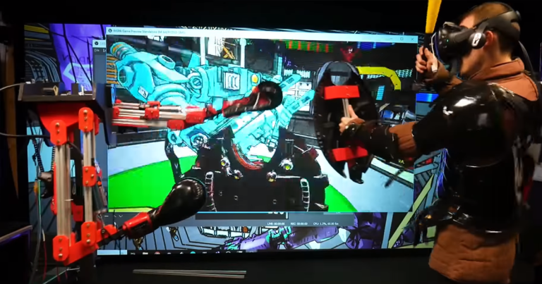 An engineer built a robot that tries to punch him in real life while he fights a digital robot in a virtual reality video game.