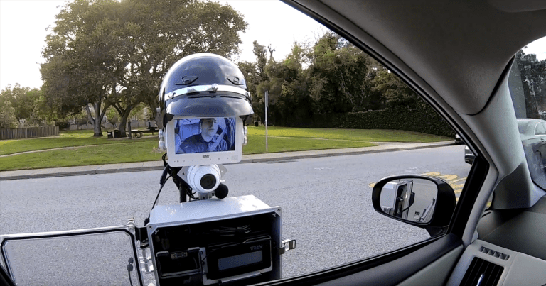 Watch This “Police Robot” Pull a Car Over