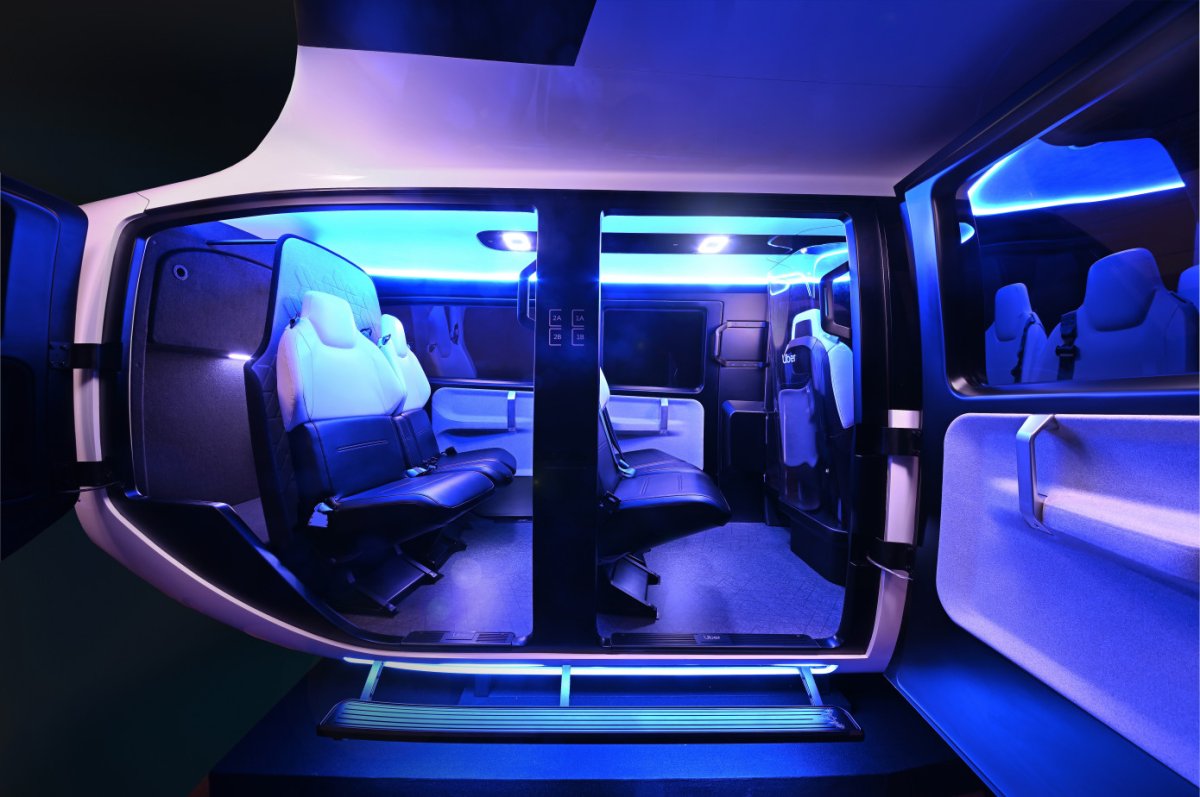 Uber Air has unveiled the first full-scale mock-up of one of the flying taxis it hopes to have ferrying passengers across the skies by 2023.