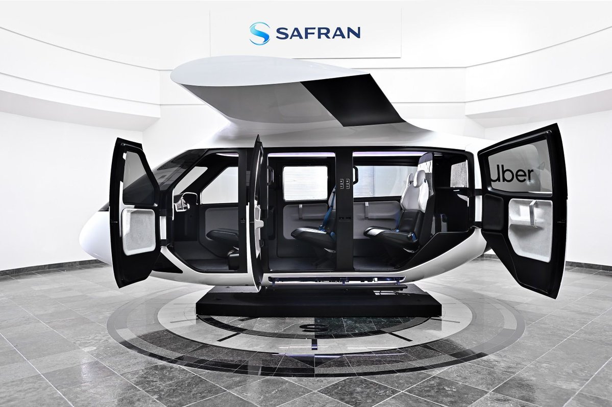 Uber Air has unveiled the first full-scale mock-up of one of the flying taxis it hopes to have ferrying passengers across the skies by 2023.