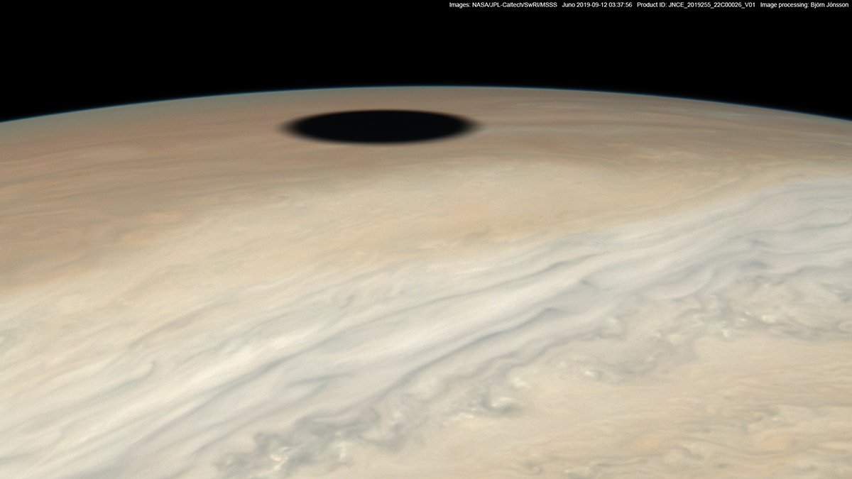 While performing a close flyby of Jupiter, NASA's Juno spacecraft captured several stunning images of a solar eclipse on the gas giant.