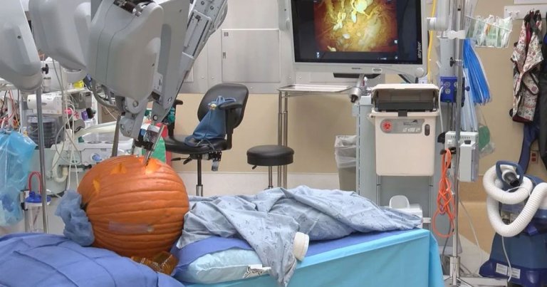 A team of surgeons from Charlotte, North Carolina have demonstrated new surgery robot technology by carving a jack-o-lantern and removing its seeds.