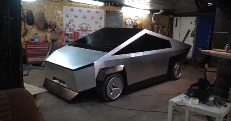 Russian YouTubers have converted an old VAZ 2109 angular hatchback into a knockoff Tesla Cybertruck, stainless steel "exoskeleton" and all.