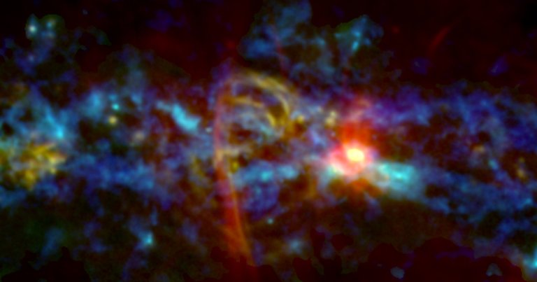 NASA just released an image of a "cosmic candy cane" in the center of the galaxy. The unusually shaped cloud is likely linked to active star formation.
