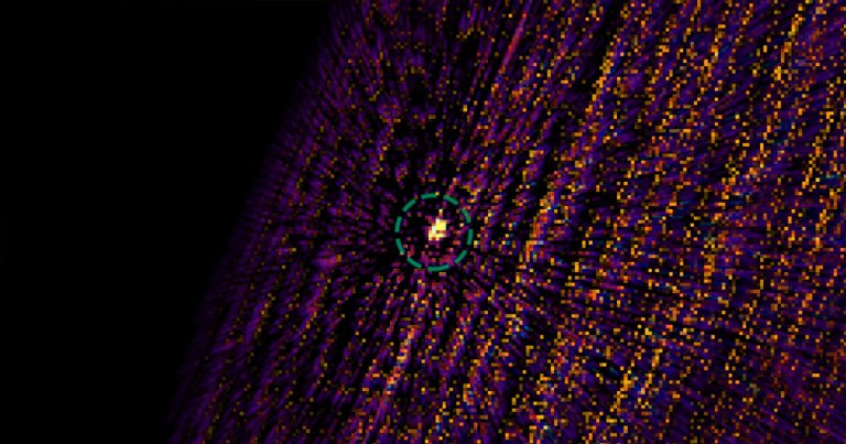 NASA's OSIRIS-REx spacecraft made an unexpected discovery, spotting a black hole emitting a massive cloud of X-rays some 30,000 light years away.