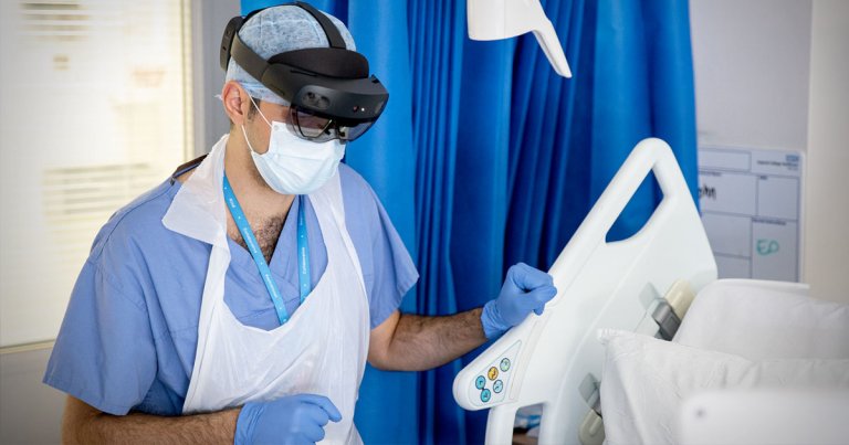 In order to limit the number of doctors who come into contact with COVID-19 patients, hospitals are using mixed reality goggles to communicate across rooms.