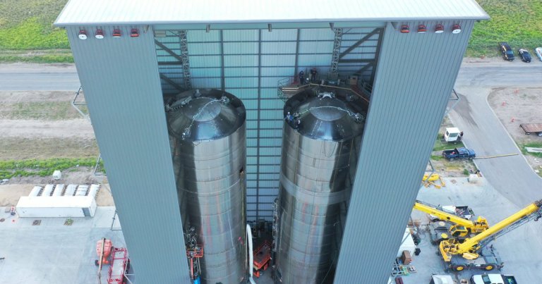 A new image uploaded by SpaceX CEO Elon Musk shows two Starship prototype tanks being assembled "in the midbay." And they're absolutely gigantic.