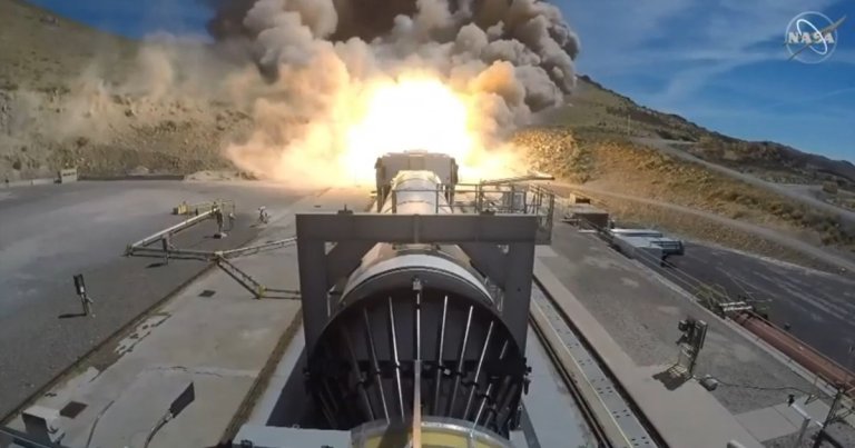 Northrop Grumman just ignited a booster for NASA's long-awaited Space Launch System (SLS). The ensuing fireball was so huge, it lit a nearby hill on fire.