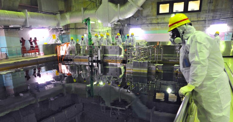 Japanese officials granted final approval to bring one of the nuclear reactors damaged by a 2011 tsunami and earthquake back online.