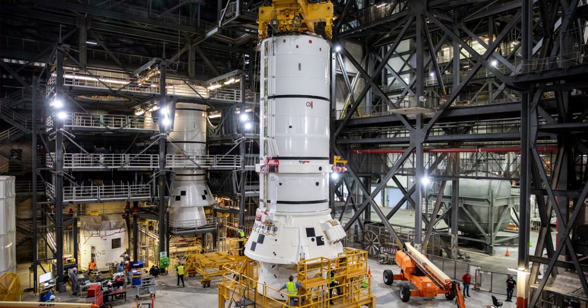 NASA has started stacking booster segments of its first heavy-lift Space Launch System at the Kennedy Space Center in Florida.