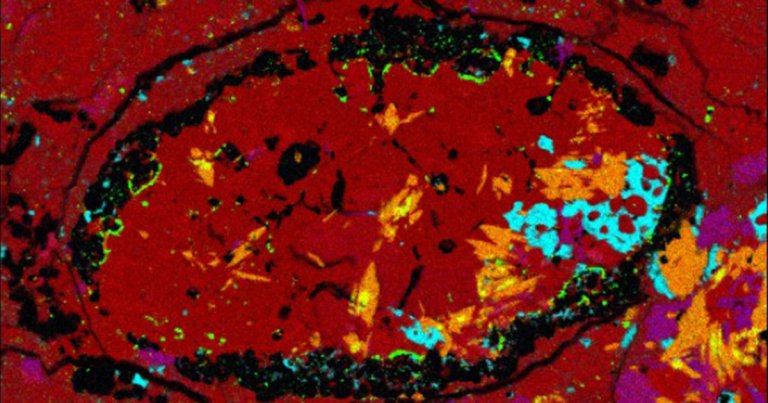 A close look at an asteroid fragment revealed crystals that likely formed on an ancient, long-gone dwarf planet-sized object.