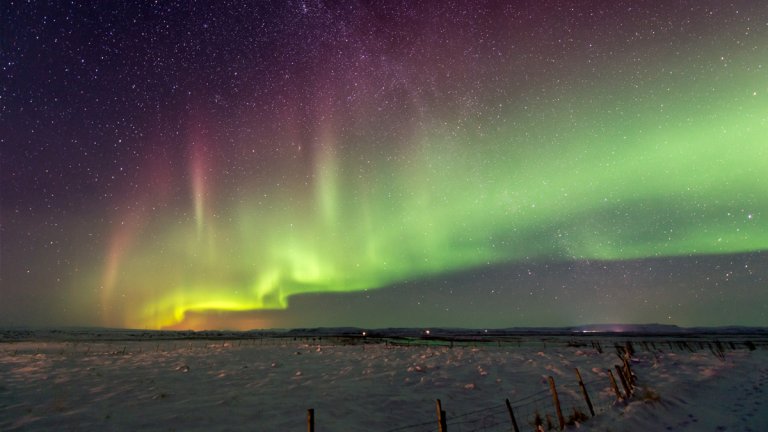 The aurora borealis will be visible in large swathes of the northern United States and Canada over Thursday night. Here's why they occur.