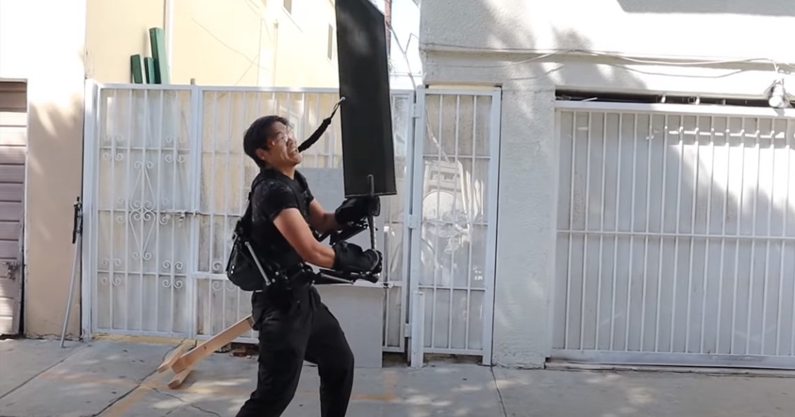 Only a YouTube inventor would buy an exoskeleton just to lift a massive 50 pound sword modeled after one found in the hit video game "Final Fantasy VII."