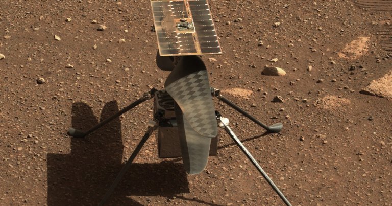 A low resolution video made up of several images shows NASA's Mars helicopter's two rotocopter blades spinning up on the surface of Mars.