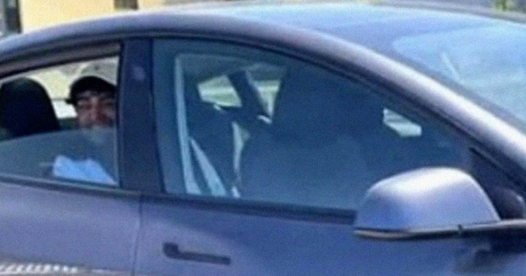 A man who was seen riding in the back seat of a Tesla without anybody in the driver's seat has been arrested by California Highway Patrol.