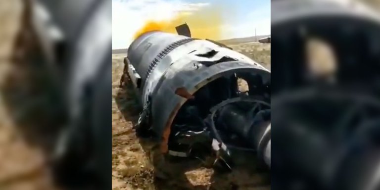A video reportedly shows part of China's Long March 2F rocket lying in the middle of the field, leaking what appears to be nitrogen tetroxide.