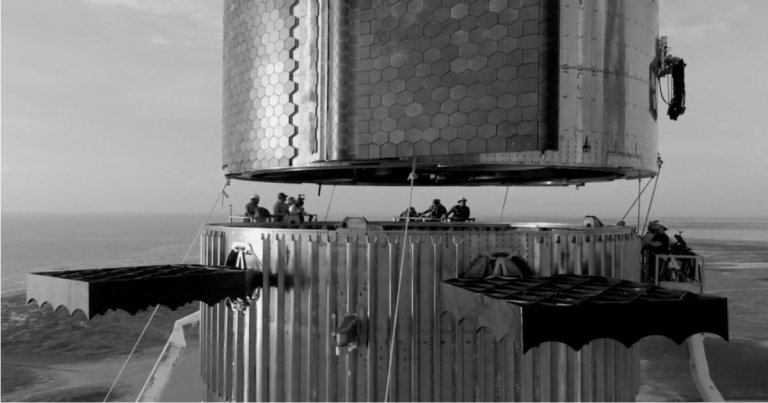 Elon Musk tweeted out a photo of the SpaceX Super Heavy Stack being assembled on Friday that showcases the dizzyingly immense size of the rocket.