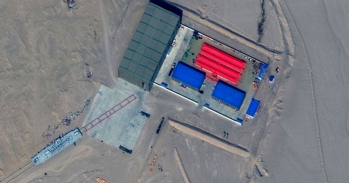 China's military has built mockups of US Navy aircraft carriers and other warships, seemingly in order to use them as target practice, Reuters reports.