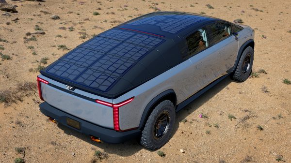 The smooth, gray truck has a similar shape to the Cybertruck, which is set to come out next year.